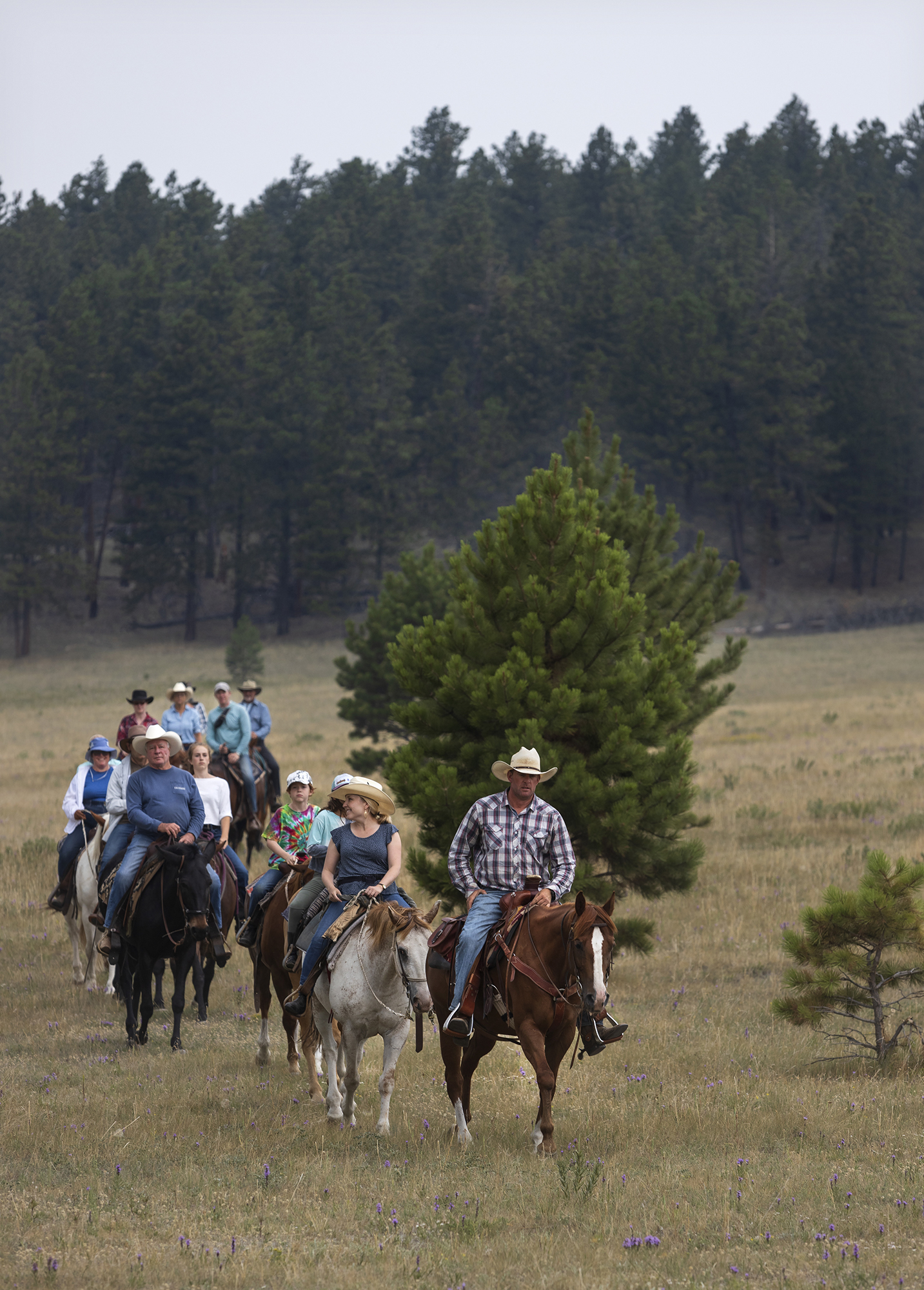 Riding in the Montana mountains on a True Guest Ranch dude ranch vacation.