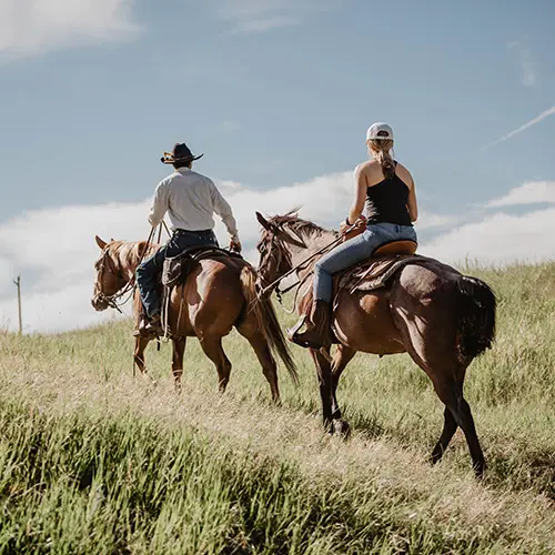 Horseback riding at a Montana dude ranch, the Circle Bar Ranch.